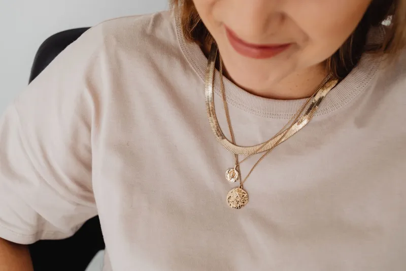 The Quiet Art of More: Mastering the Layered Necklace Through Italian Abundance and Japanese Restraint